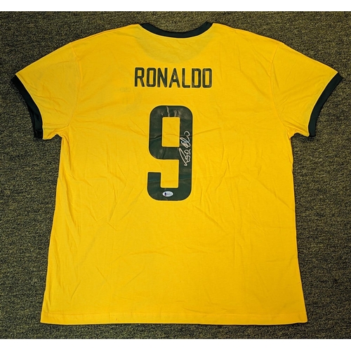 211 - CBD Brazil Jersey signed by Ronaldo Luís Nazário de Lima Certificate of Authenticity sticker on top,... 