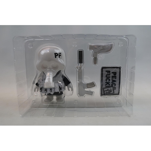 23 - SQUADT GERM s006 PEACE FUCKER includes the following: 6” Squadt vinyl figure Boxed