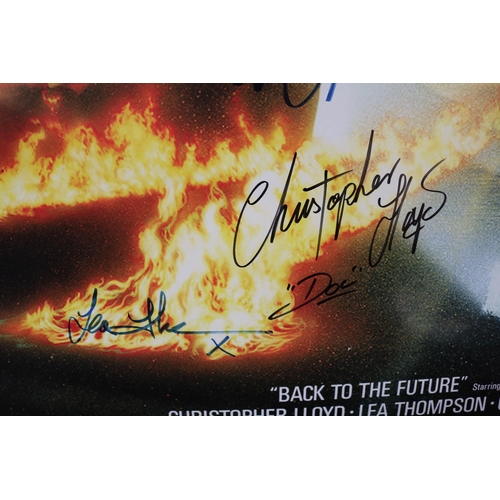 61 - Back to the Future signed poster - signed by all main cast members. Micheal Fox, Christopher Lloyd, ... 