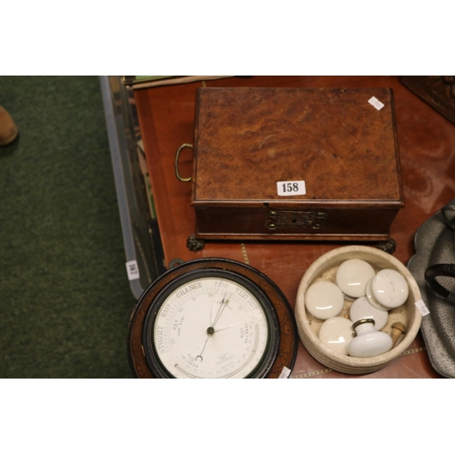 158 - Oak Carved wall barometer, Walnut cased box on brass paw feet and a collection of Porcelain Knobs