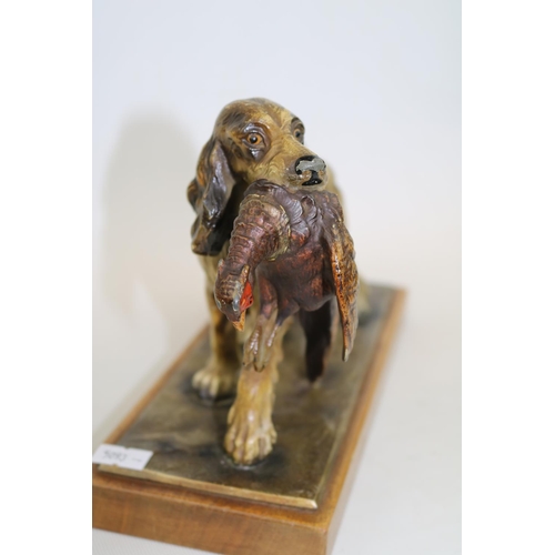 66 - Cold Painted table lighter in the form of a Springer Spaniel with Pheasant in mouth mounted on woode... 