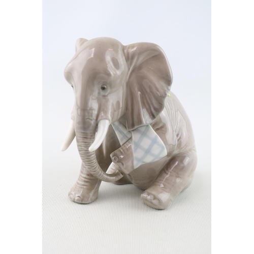 92 - Lladro figure of a Elephant in sling