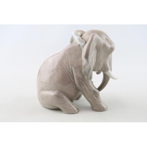 92 - Lladro figure of a Elephant in sling