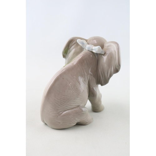 92 - Lladro figure of a Elephant in sling