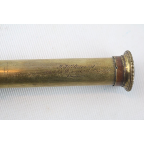 236 - Small Four-draw brass and leather bound telescope, marked London with Leather mounts