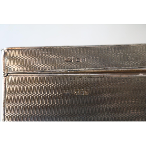 238 - Early 20thC Silver machined Cigarette box and a Military Silver mounted cigarette box