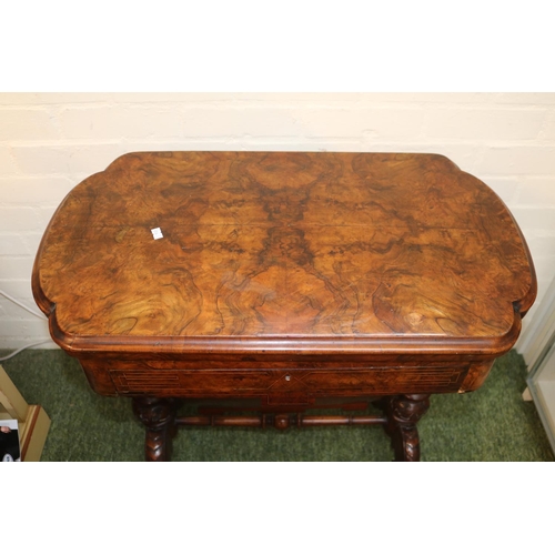 284 - Good quality Victorian games table with quartered veneer, inlaid to interior and sewing base over tu... 