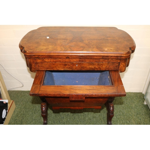 284 - Good quality Victorian games table with quartered veneer, inlaid to interior and sewing base over tu... 