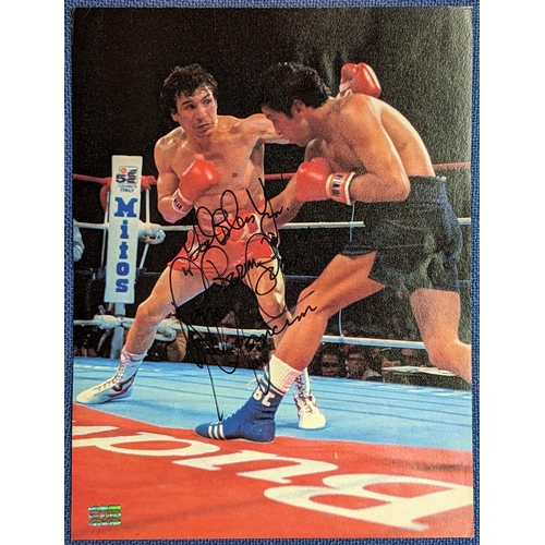 36 - Magazine Page signed by boxer 