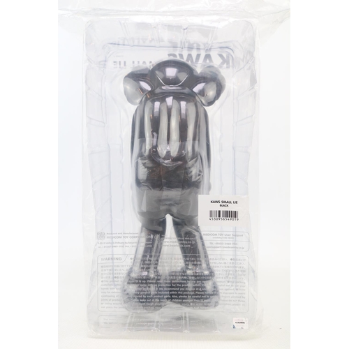 73 - Small Lie Companion by KAWS (AKA Brian Donnelly, b1974). Created in 2017 this black open edition Com... 