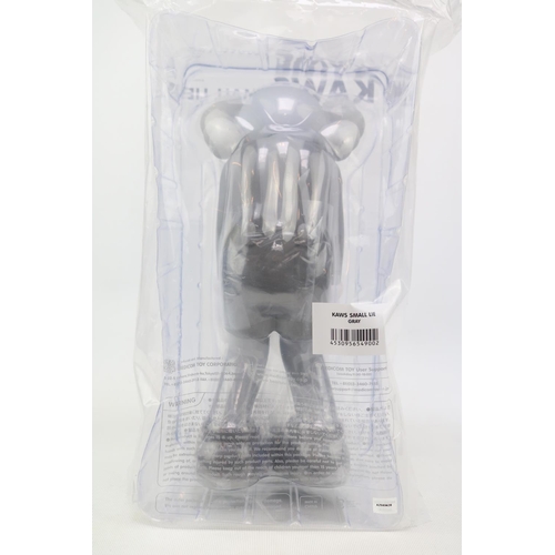 77 - Small Lie Companion by KAWS (AKA Brian Donnelly, b1974). Created in 2017 this grey open edition Comp... 