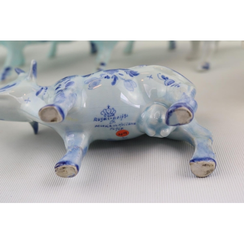 133 - Collection of 7 Delft Cow Creamers inc. Royal Delft Example