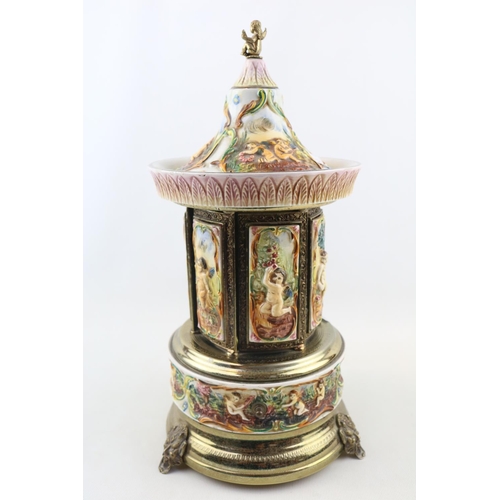 135 - Italian Automated wind up cigarette dispenser with figural decoration