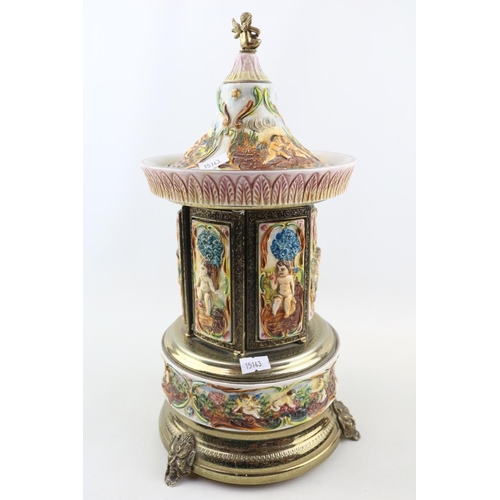 135 - Italian Automated wind up cigarette dispenser with figural decoration