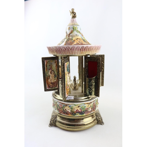 135 - Italian Automated wind up cigarette dispenser with figural decoration