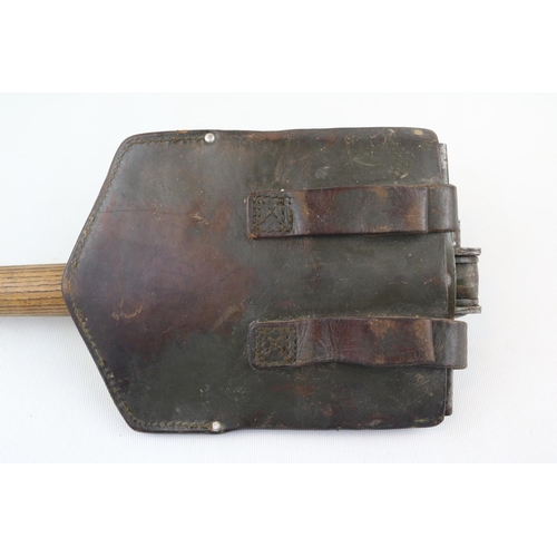 137 - German Military Folding Shovel/Pick Axe in Leather sheath dated 1964