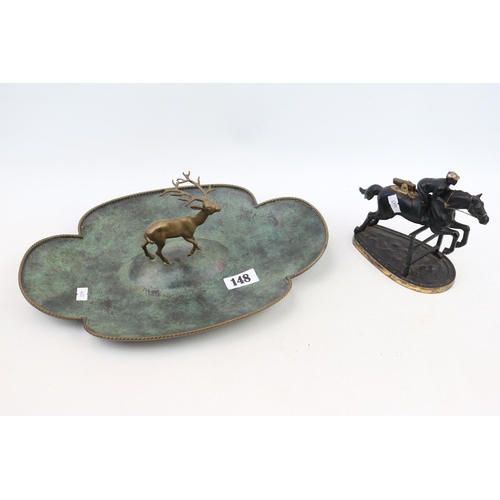 148 - Metal desk Lighter in the form of a Racing Horse and a cloverleaf shaped table centrepiece with Stag... 