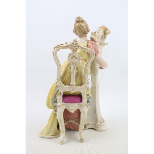 2 - European Bisque porcelain figure of a woman playing a Harp with scrolled mark to base and Arrow blue... 