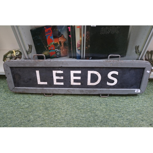 45 - Railwayana; Railway handheld sign for Leeds with wooden and metal frame. 107cm in Length