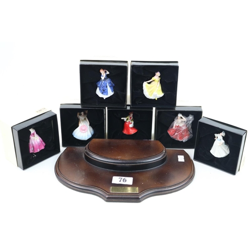 76 - Set of 6 Boxed Royal Doulton miniature figurines on wooden stand