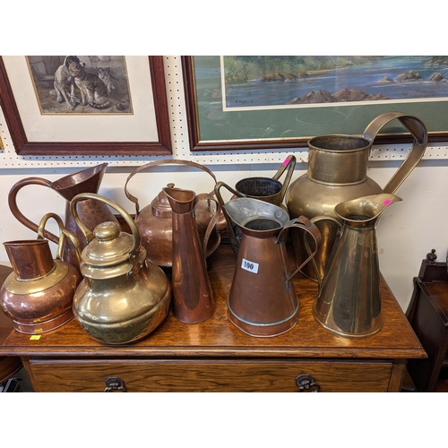 100 - Collection of assorted Brass and Copper Jugs and Kettles