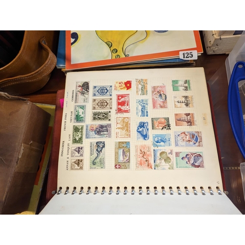 124 - Large album of 20thC Stamps and 2 Volumes of 'With the flag to Pretoria' by Harmsworth Brothers