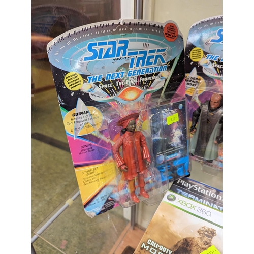 15 - 2 Carded Star Trek Next Generation figures, Space Precinct figure, Robotech figure and 2 Video Games