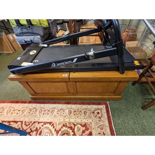 331 - Good quality Oak coffee table with ottoman interior