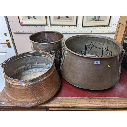 79 - 2 Middle eastern Copper cook pots and a Middle eastern floral decorated Jardinière