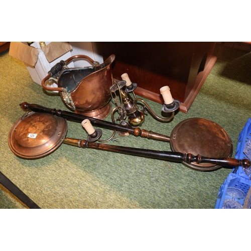 121 - 2 19thC Copper Warming Pans with turned handles, Copper coal helmet and a Brass 3 Branch Chandelier