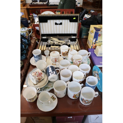 139 - Collection of assorted Royal Commemorative Mugs and a Cased Canteen of Cutlery