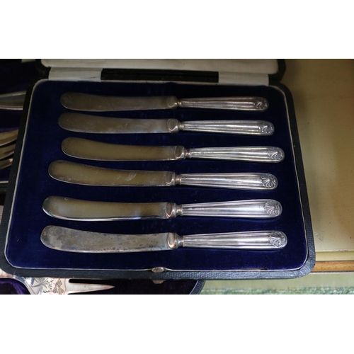 33 - Collection of assorted boxed Flatware and a Boxed set of 6 Silver handled butter knives