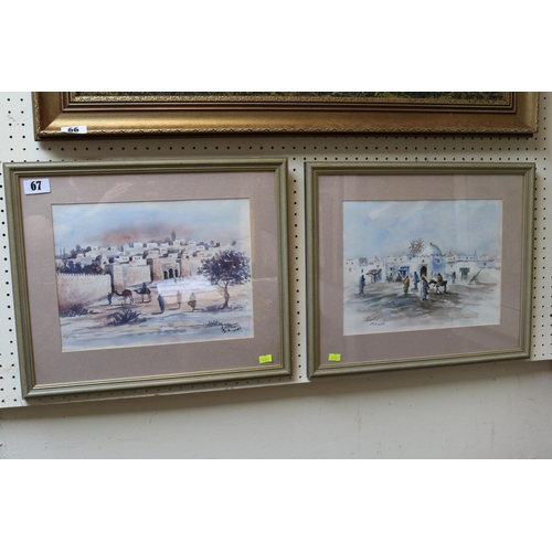 67 - Pair of Framed watercolours of North African scenes signed