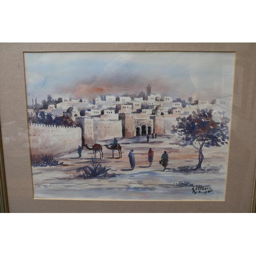 67 - Pair of Framed watercolours of North African scenes signed