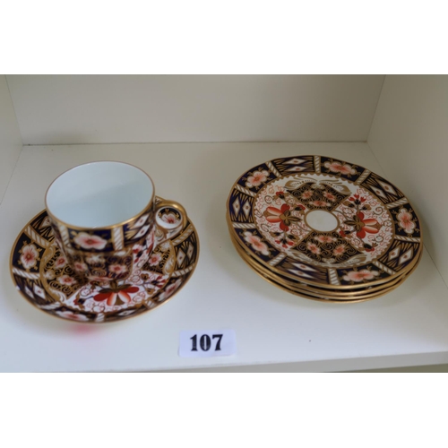 107 - Royal Crown Derby Imari pattern, set of four sandwich plates and tea cup and saucer.