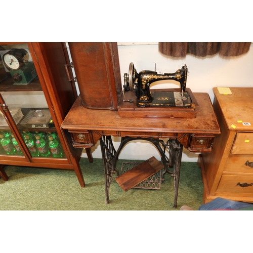 143 - Singer Sewing Machine on Treadle base