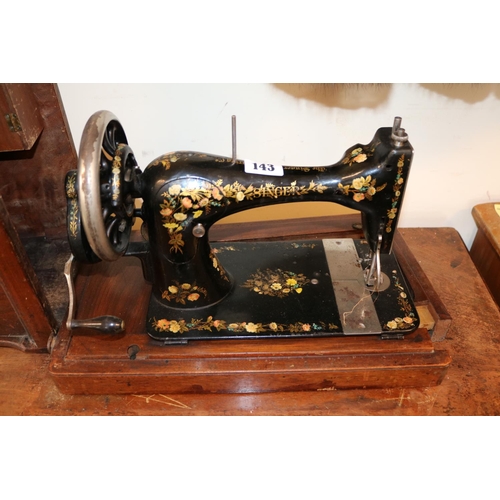 143 - Singer Sewing Machine on Treadle base