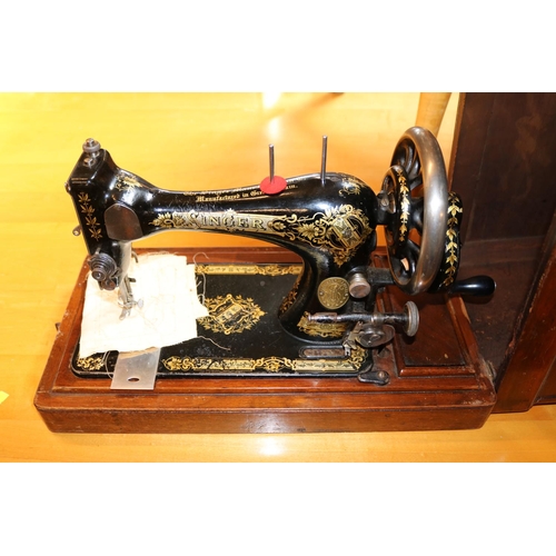 201 - Mahogany cased Singer Sewing machine R303377