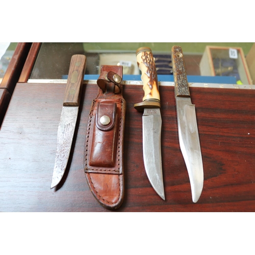 340 - Schade of USA Antler handle knife in Leather scabbard and 2 other knives