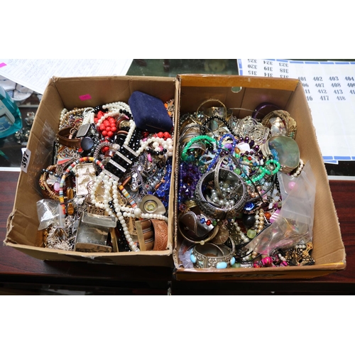 397 - 2 Boxes of assorted Costume jewellery inc. Necklaces, Bangles etc