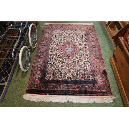 469 - Good quality Red Ground Persian Silk Rug with central medallion and floral borders and tassel end 17... 