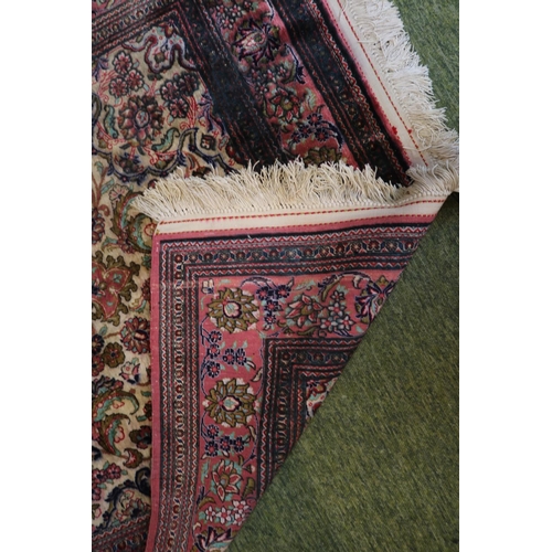 469 - Good quality Red Ground Persian Silk Rug with central medallion and floral borders and tassel end 17... 