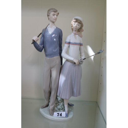 74 - Lladro golfing couple figurine