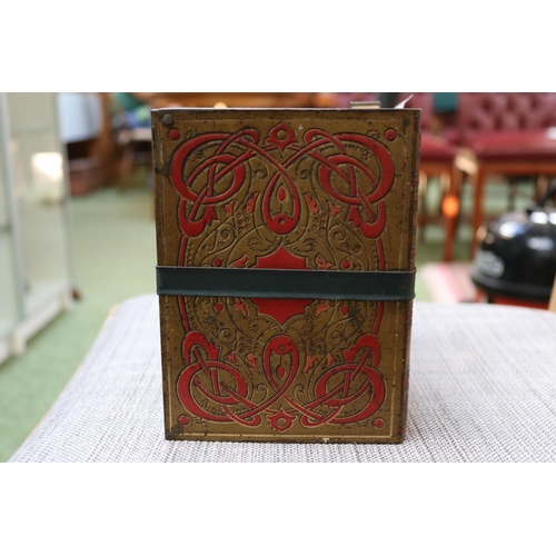 84 - Antique Huntley & Palmers biscuit tin in the form of eight bound books.