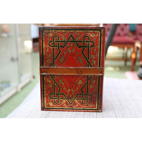 85 - Antique Huntley & Palmers biscuit tin in the form of eight bound books.