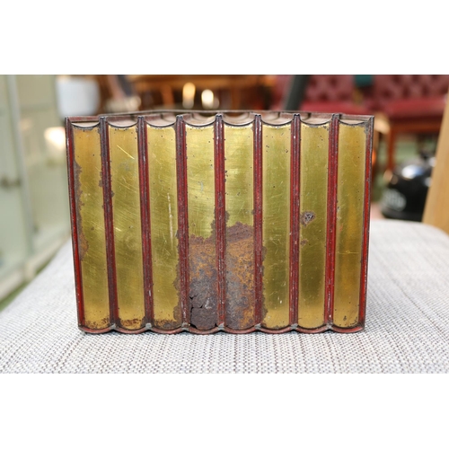 85 - Antique Huntley & Palmers biscuit tin in the form of eight bound books.