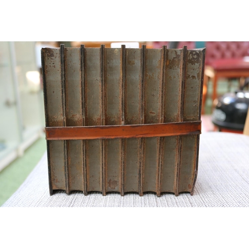 86 - Antique Huntley & Palmers biscuit tin in the form of eight bound books.