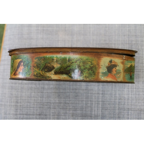 87 - Antique Huntley & Palmers biscuit tin in the form of an artists pallet also depicting an artist at w... 