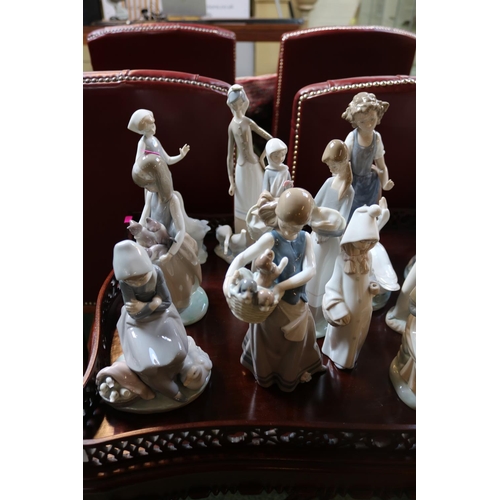 302 - Good Collection of Lladro & Nao Figurines to include Horses, Girl with puppies, Geese etc