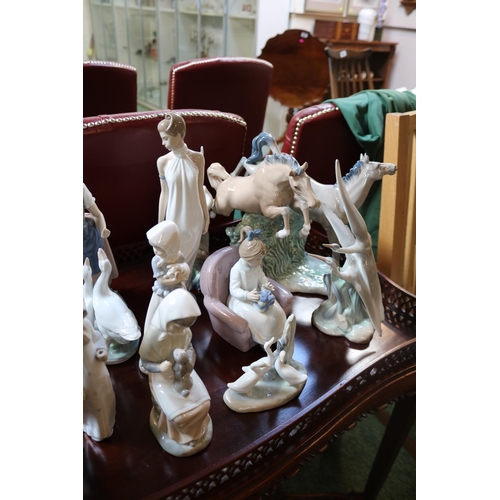 302 - Good Collection of Lladro & Nao Figurines to include Horses, Girl with puppies, Geese etc